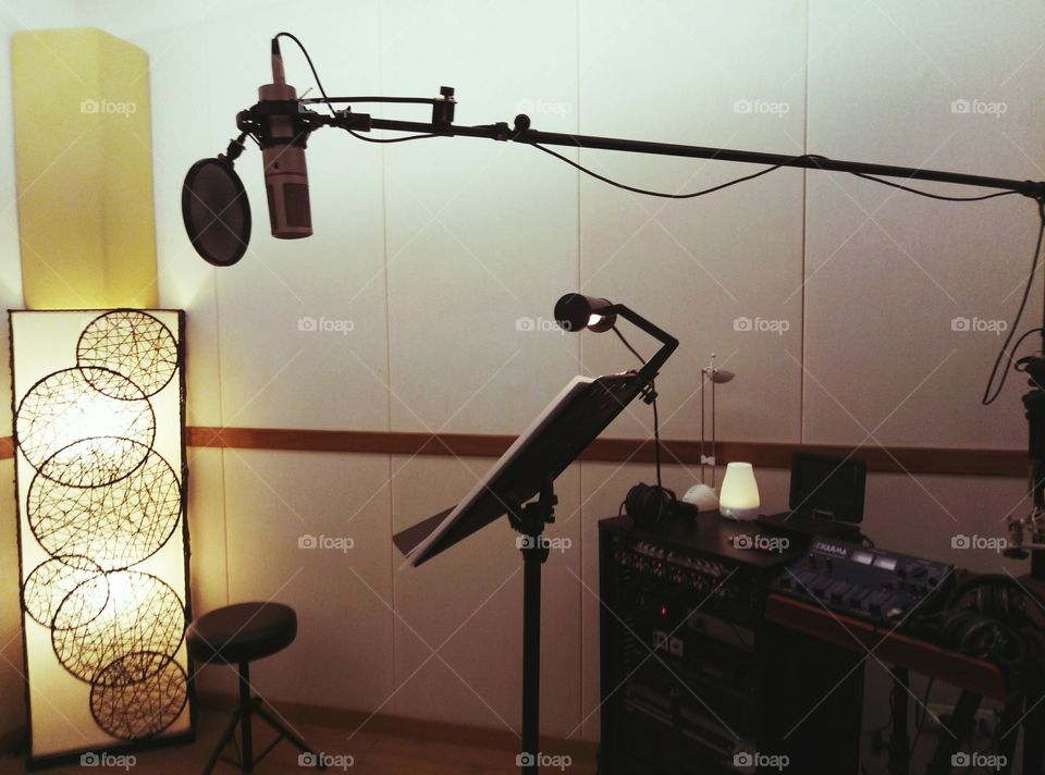 Recording studio. Microphone holder with anti-pop filter and music holder.