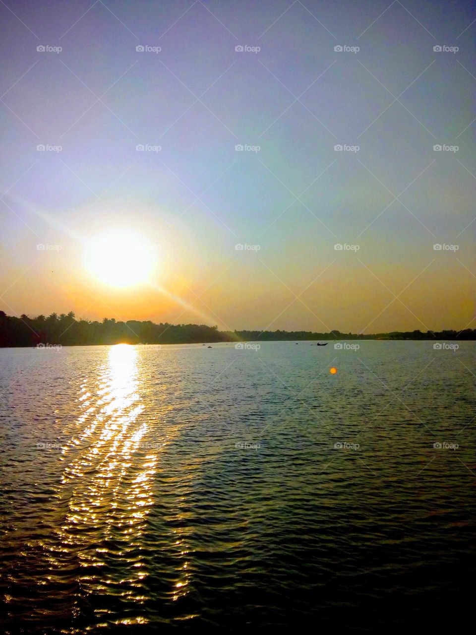 Sunset Time In The Ganga River.