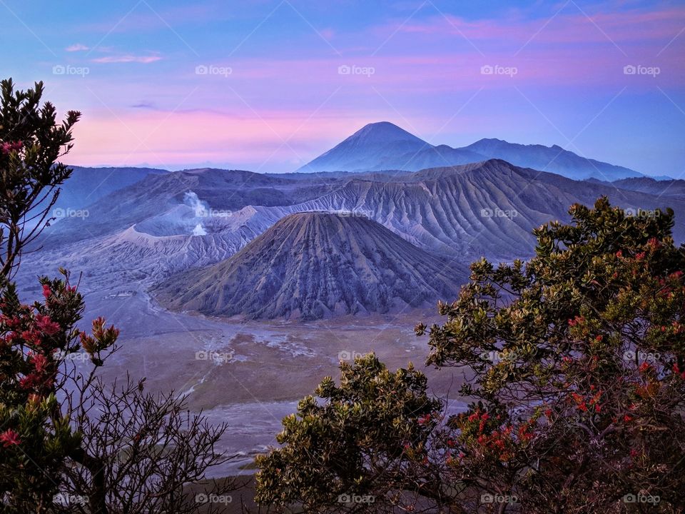 Early wake-up call for the hike of a lifetime to see this beautiful landscape of Mount Bromo volcano and Mount Semeru in the back