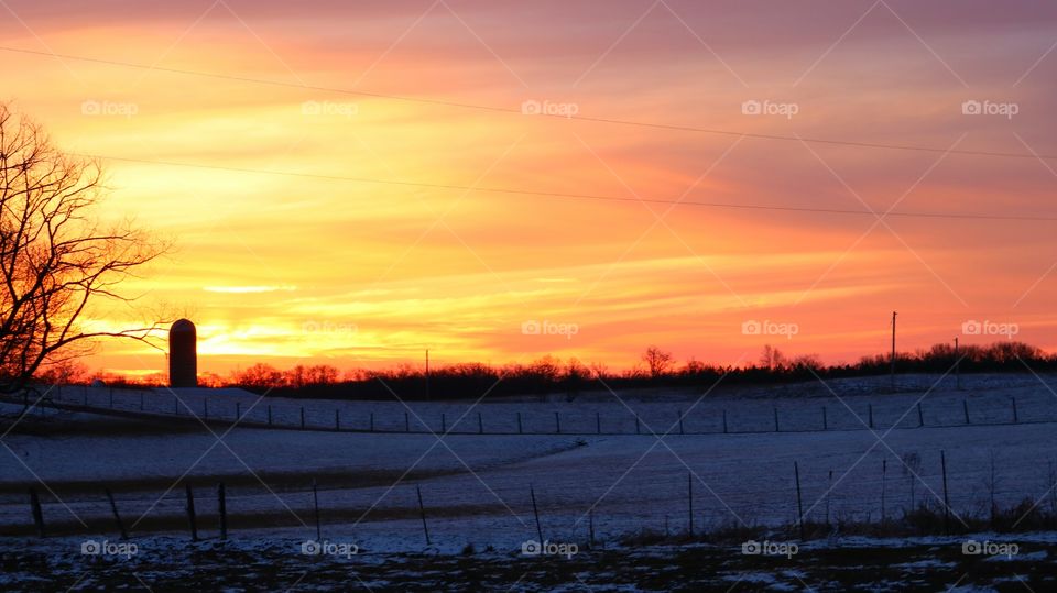 sunrise on the farm in winter