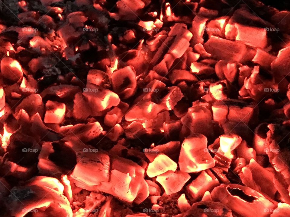 Hot fire coals glowing 