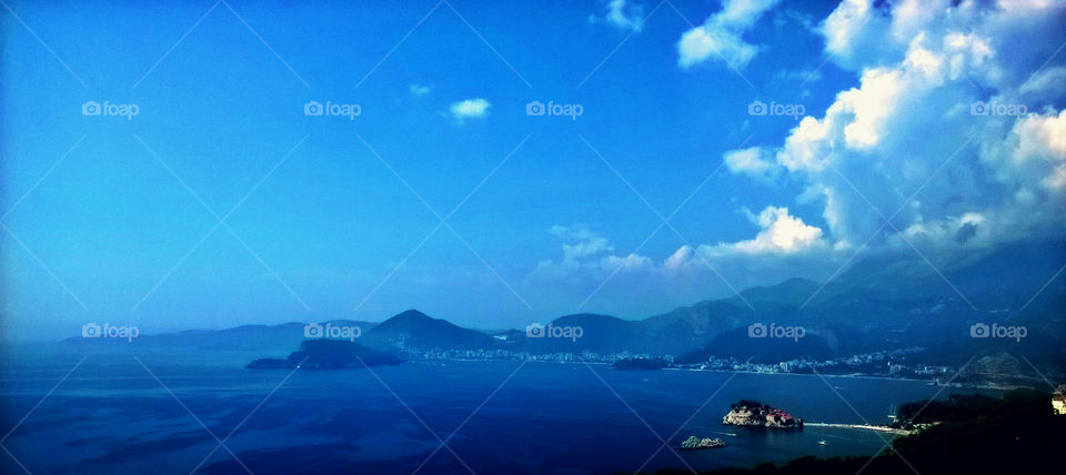blue. sky, sea, island, clouds and city