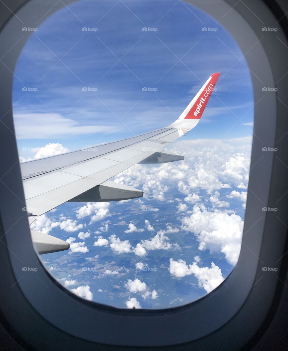 Airplane wing visible through the window 