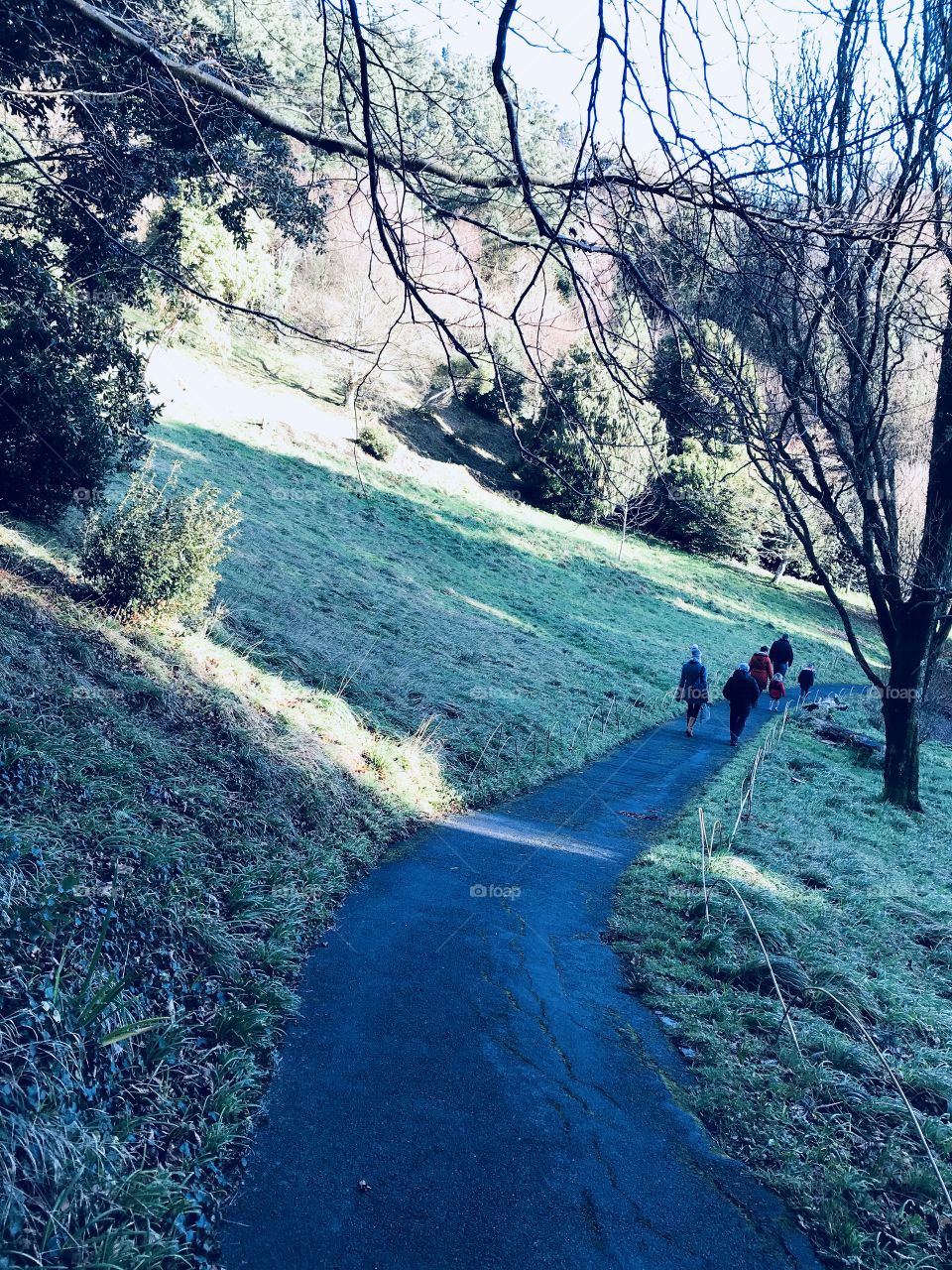 Late afternoon ramblers disappearing in the far distance.