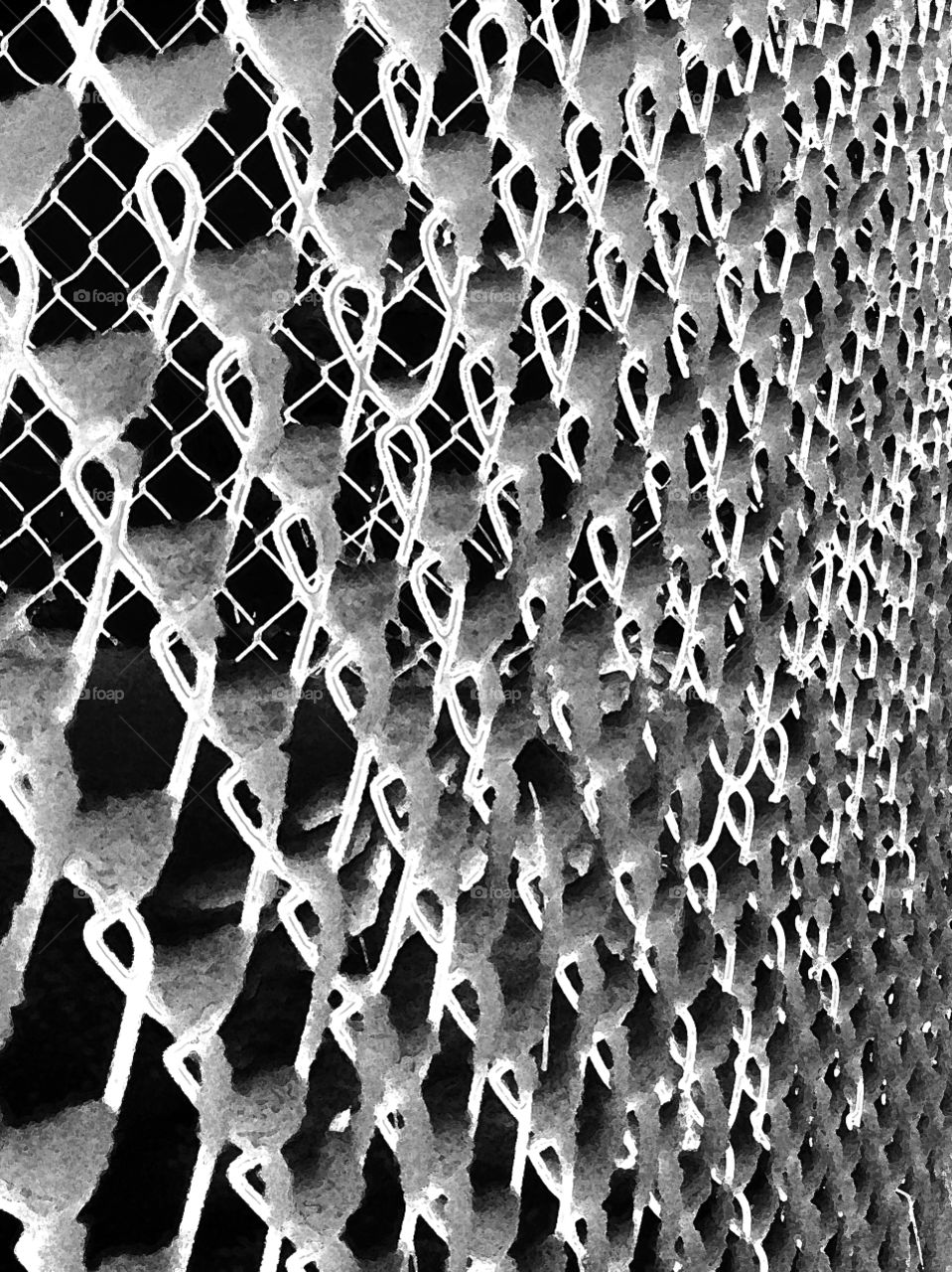 It was an abstract day today and i was taking some of my ice and snow pictures and experimenting with some desktop techniques and tools. This is a black and white abstract of snow on a chainlink fence.