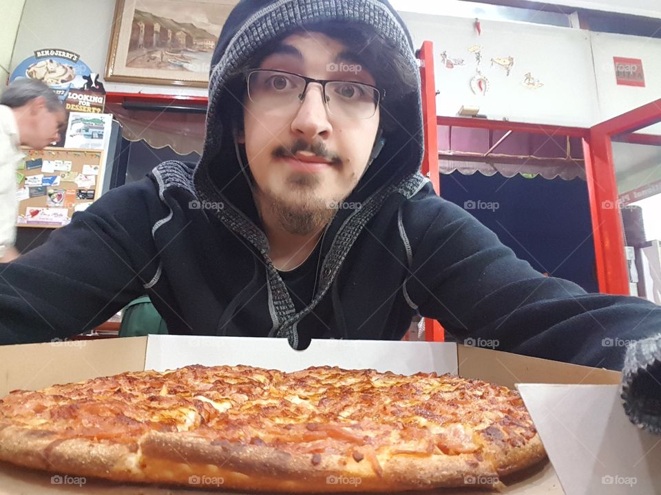 Thats me, about a year ago, with a pizza from Marrios