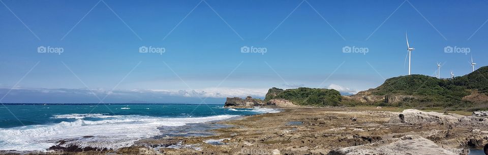 windmills by the beach in philippines