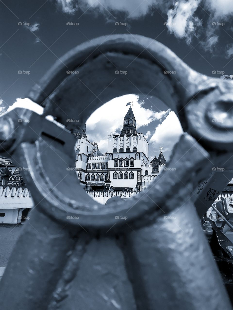 View of the castle tower through a round hole