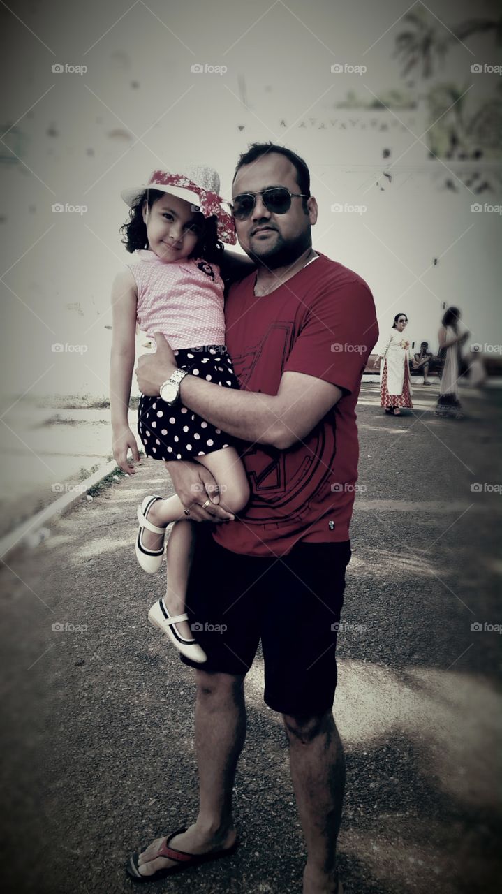 enjoying holidays.  Father and the daughter