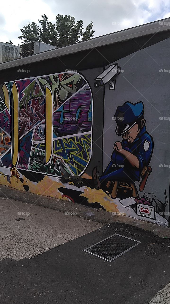 Back alley art / eye see everything. I was taking a shortcut to the store