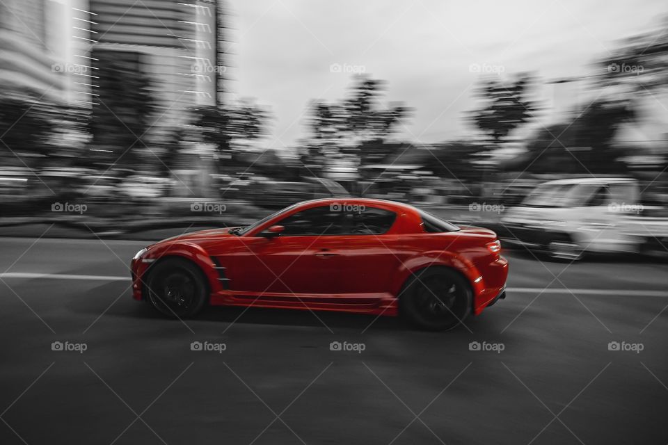 red car on the street