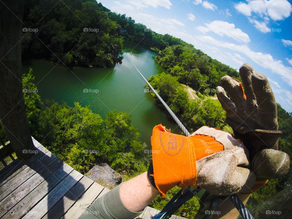 Zip-lining off tower 