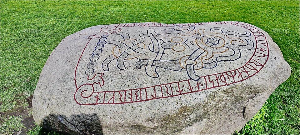 This is an ancient stone with runic inscriptions found by the old “Viking” fortress in “Trelleborg”, “Sweden” by the “Baltic Sea”. 2023. Hypnotic Productions