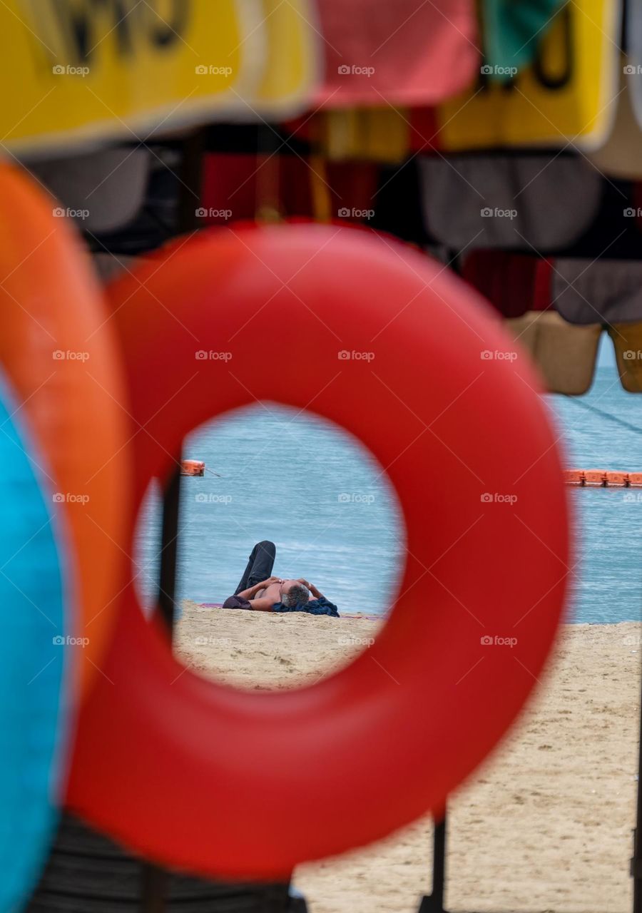 Strength view photo of Sunbath on the beach