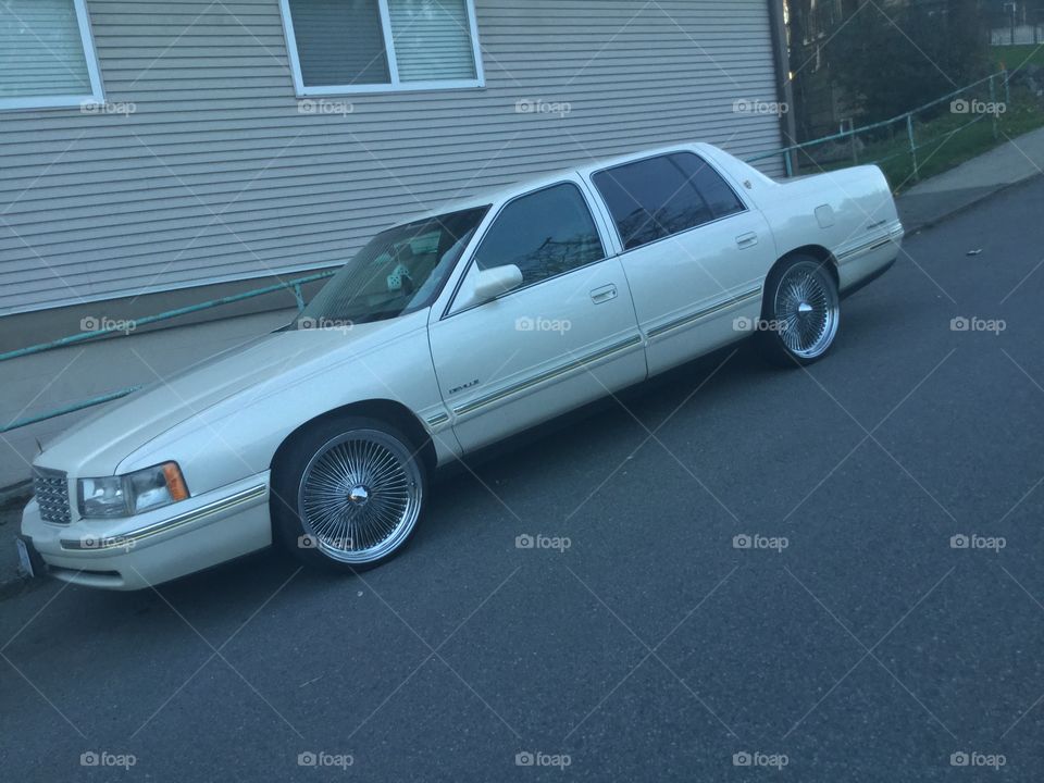 Deville Car Parked on the Road 