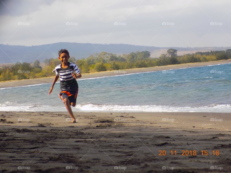 children run beach holiday sport