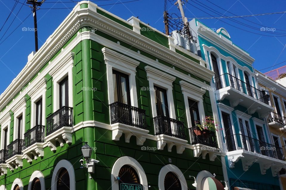 Vibrant green building . Corner building in San Juan PR.