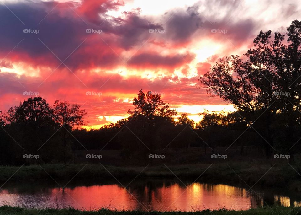 Sunset with a pond view