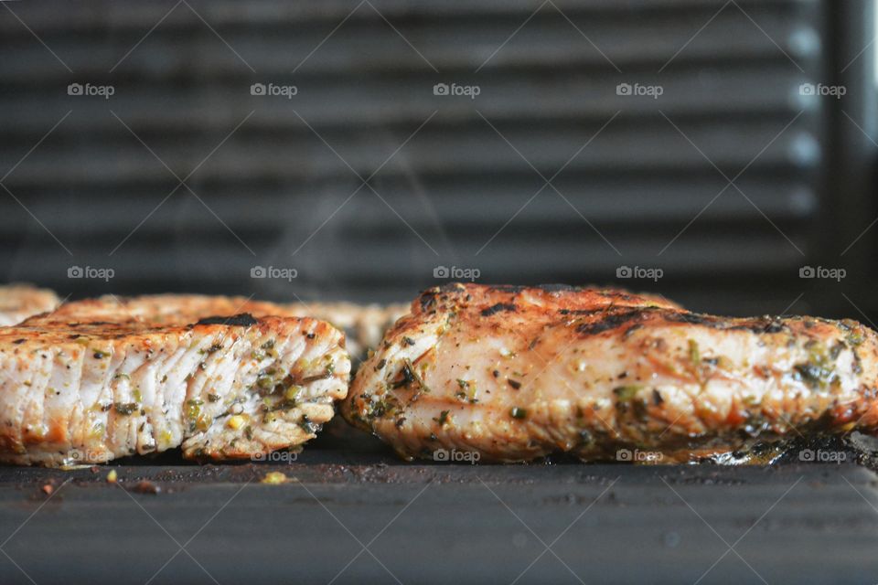 Cooking food on grill