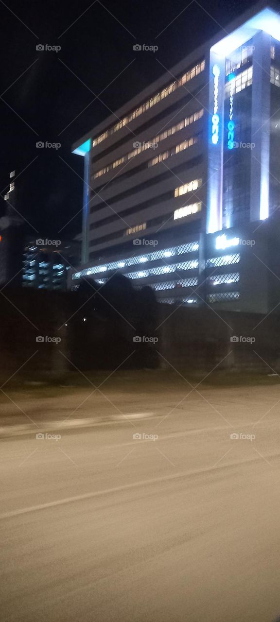 Twinkling windows , the beauty of evening light. Bask in the beauty of evening light with the view of light twinkling from these windows at night