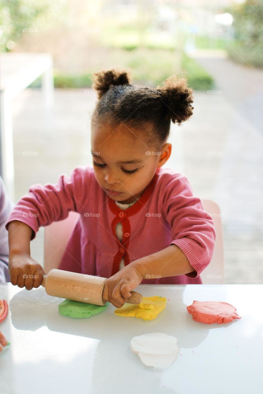 Little girl crafting