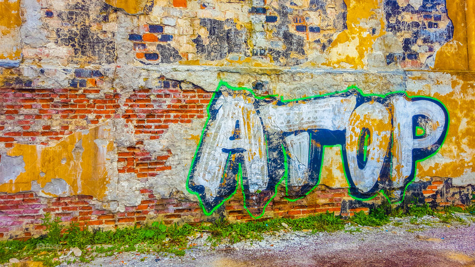 old graffiti on a rotten wall