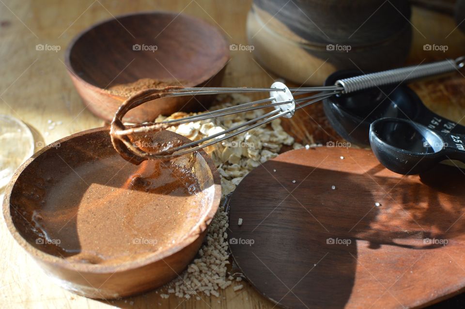 Weekend pampering beauty routine making home made skin softening and exfoliating facial masks with cinnamon, nutmeg, honey,raw sugar, oatmeal ingredients for youthful skin and relaxation 