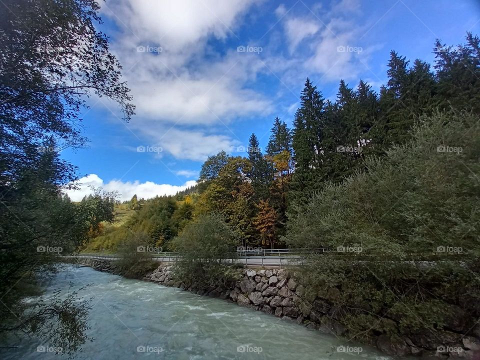 Mountain Stream by a Road