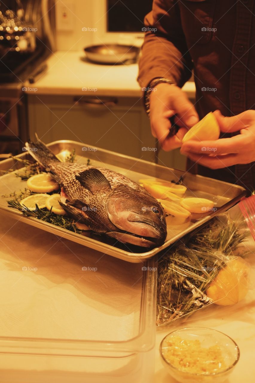 Chef Prepares Seafood Dinner At Home In Kitchen 