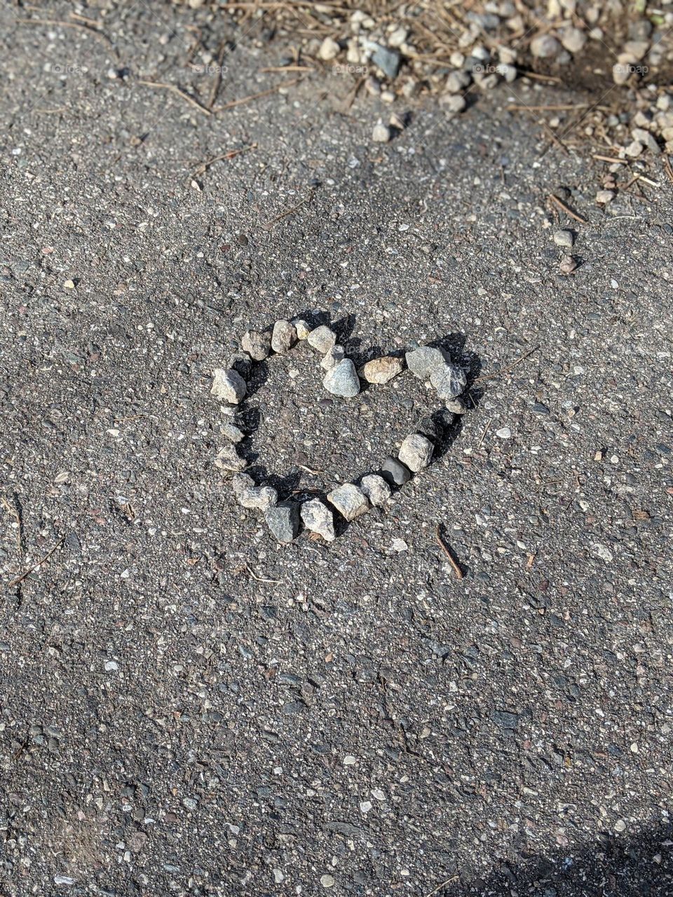 heart made from rocks on nature walk