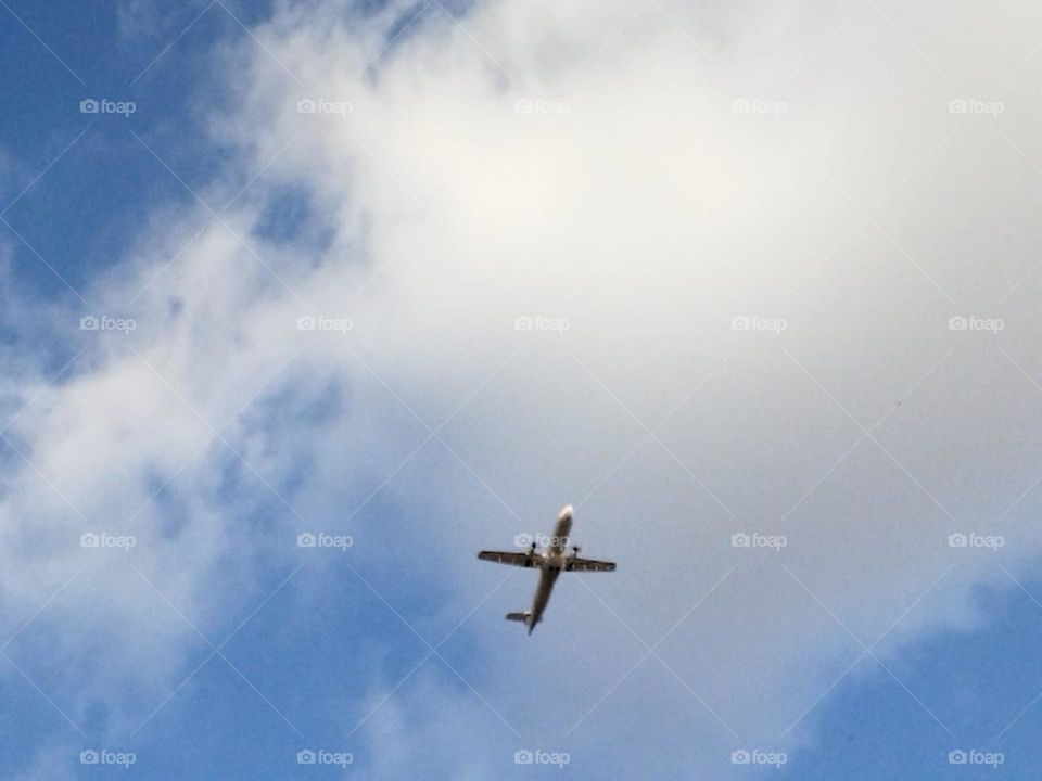 Beautiful airplane flying cross the sky.