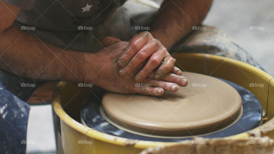 Close-up of a potter making pottery