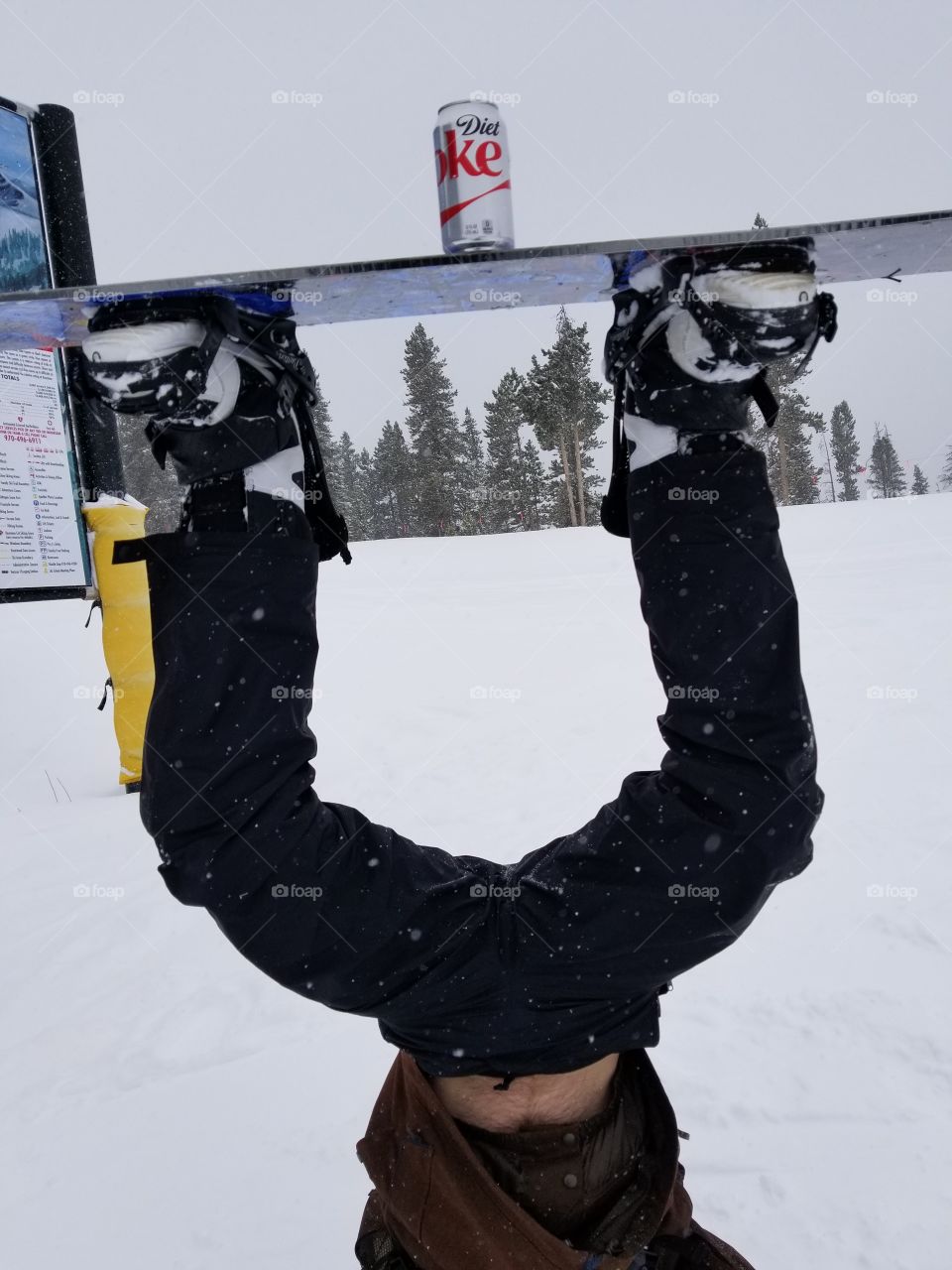 Enjoying a coke... upside down