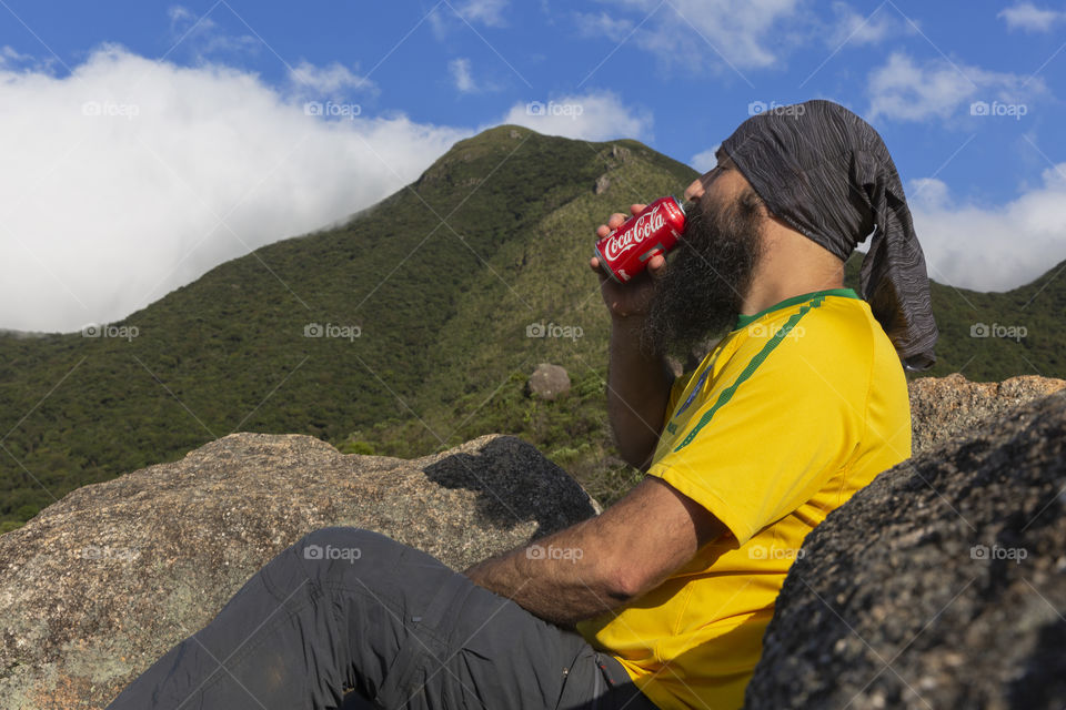 Coca Cola face to face with the mountain.