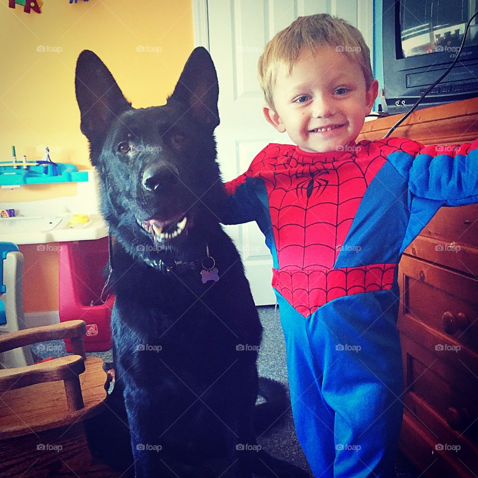 Portrait of little boy with his pet dog