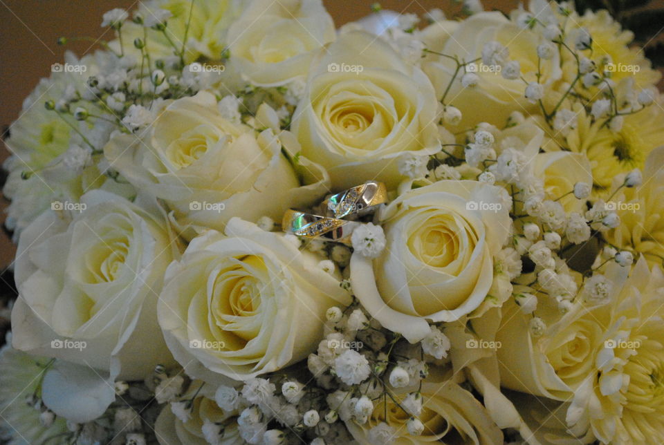 rings in bouquet . wedding scenario 