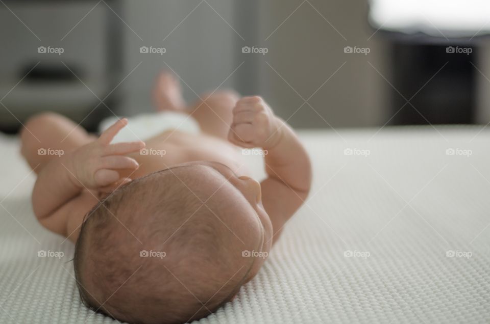 Baby on bed