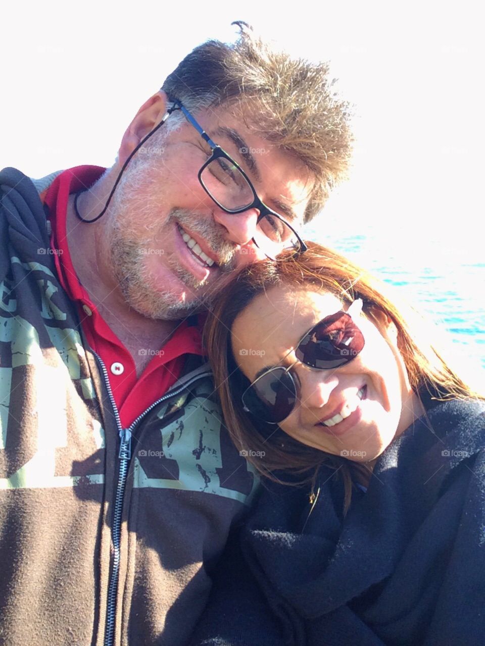 Couple embracing smiling 