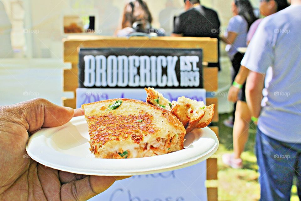 a delicious spicy grilled cheese sandwich at the grilled cheese festival.