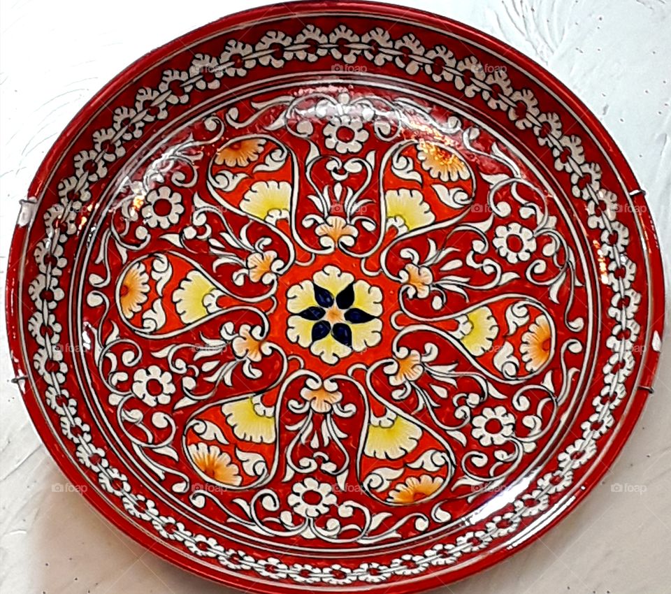 Beautiful plate on the white background. It is Russian traditional plate