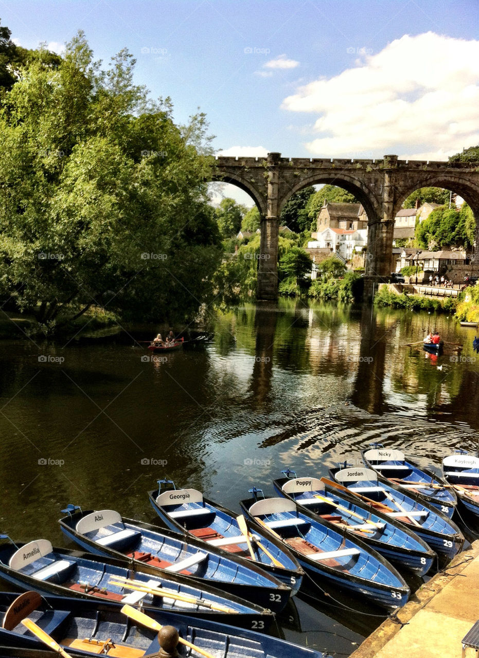 Rowing boats on an English river on a summer day