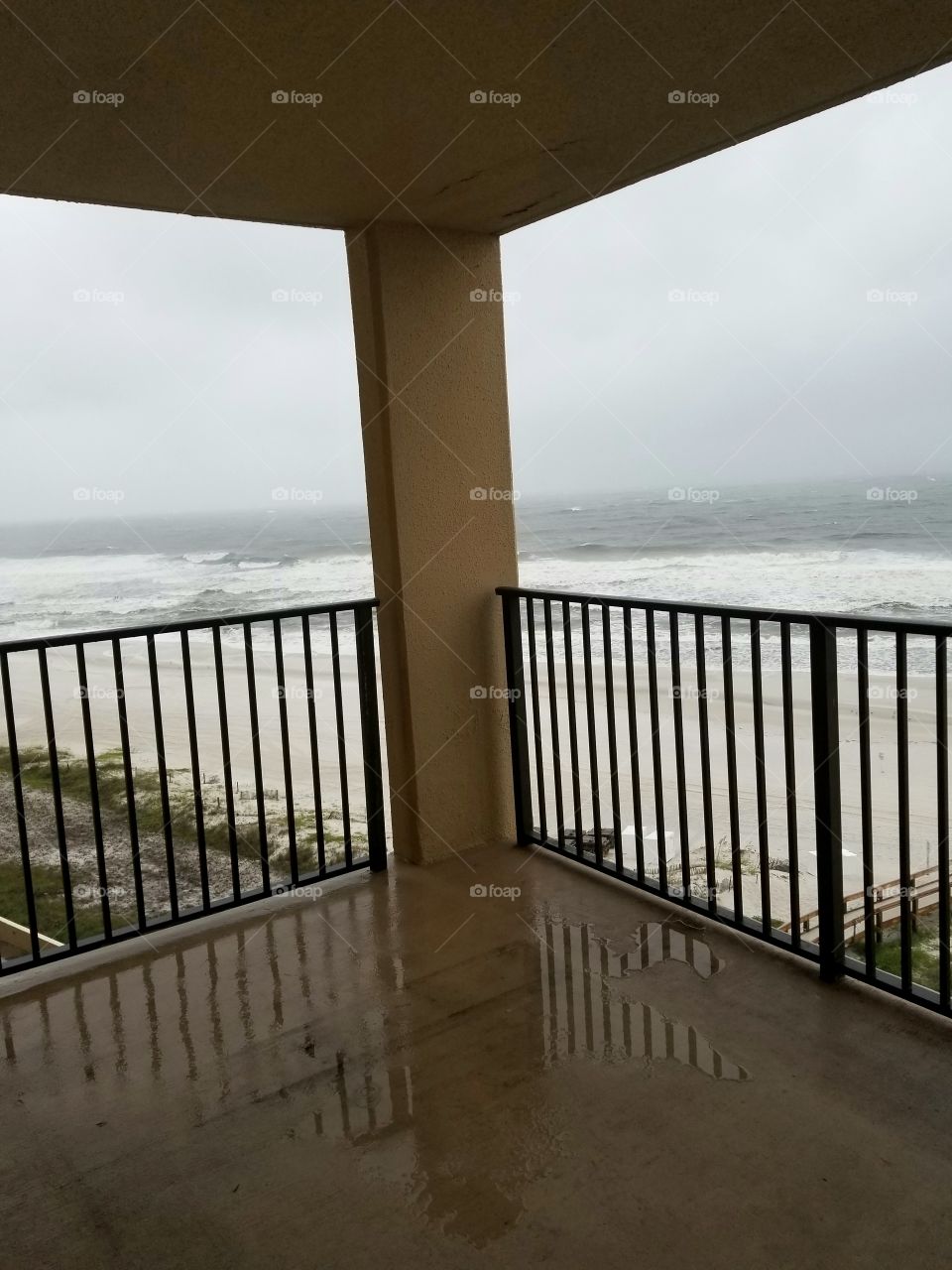 tropical storm, waves, wind, a very gray kind of day