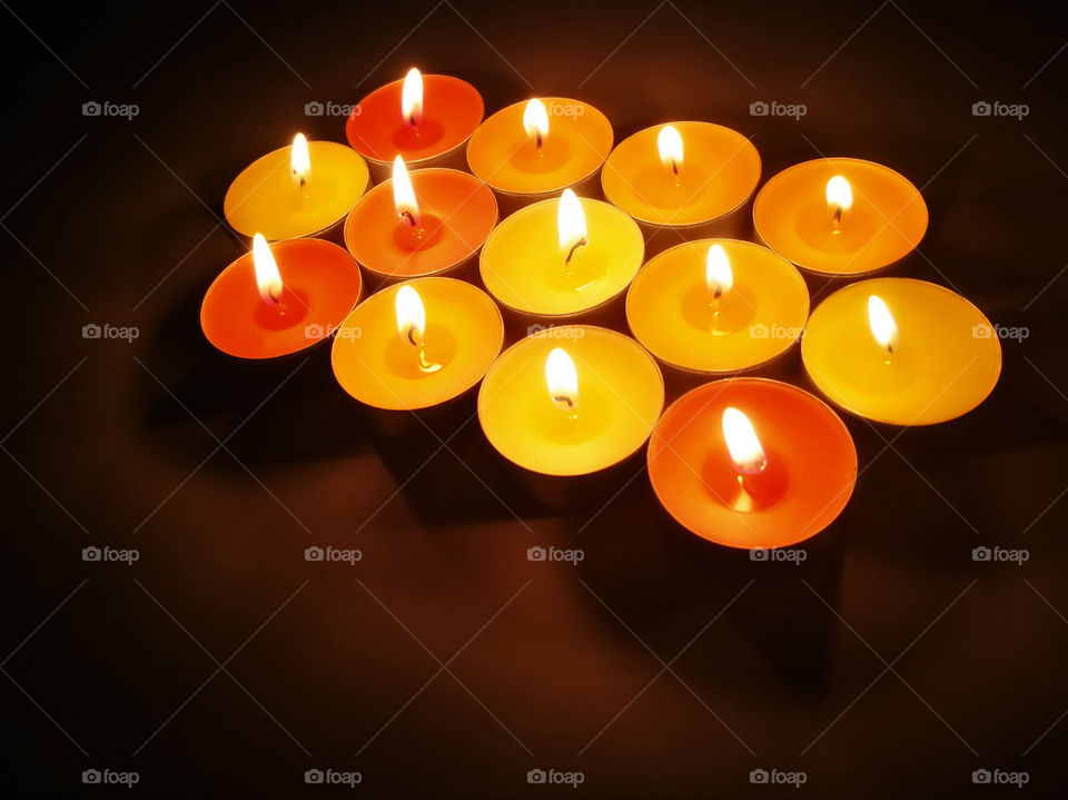 Tealight candles with blurred dark background