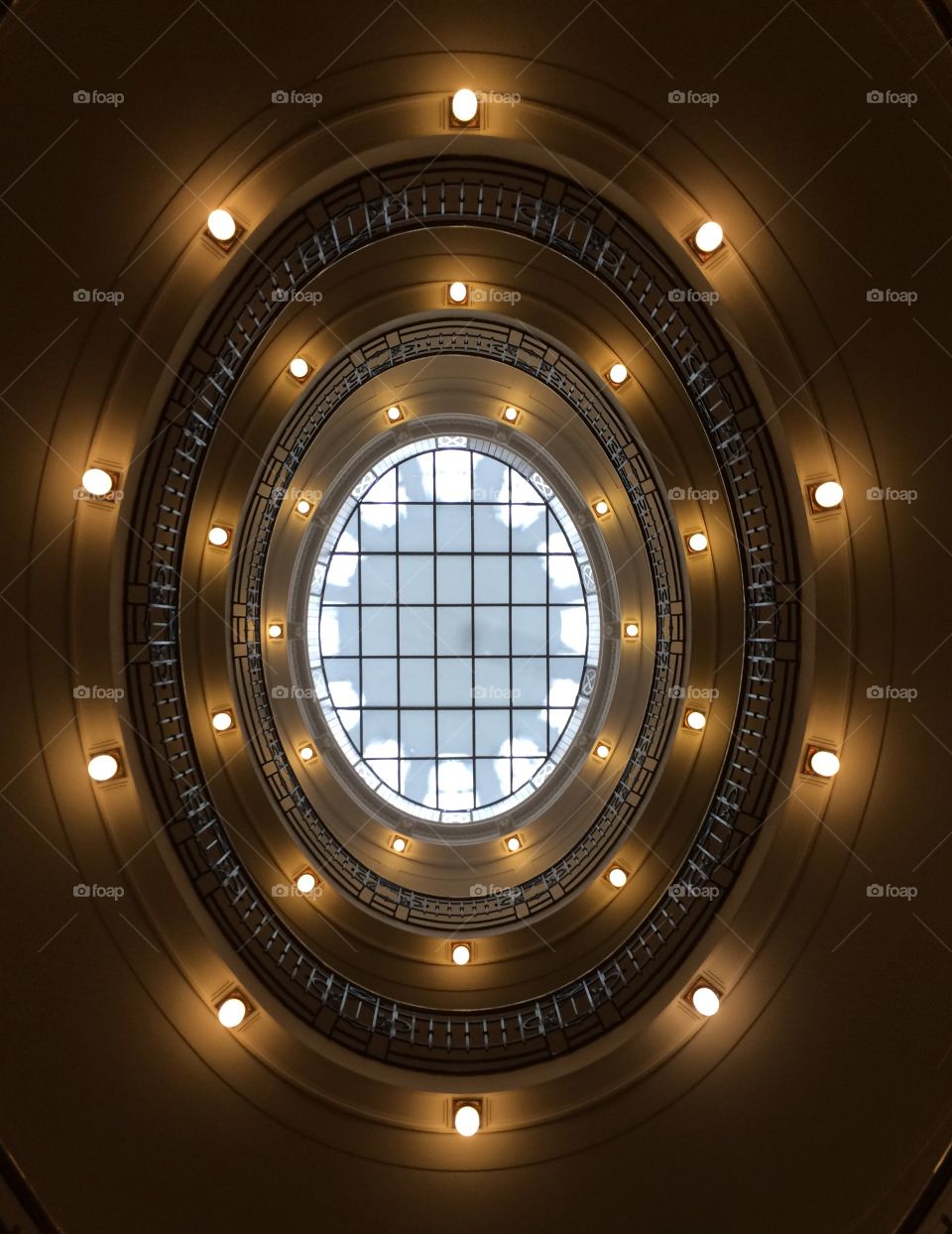 Rotunda stairwell. Looking up five floors in a rotunda at the Ministry of Industry and Trade in Prague