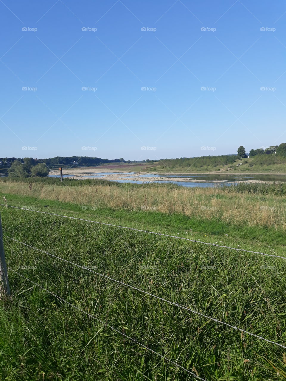 The Maas river almost dry in summer
left side is Belgium, right side is Holland