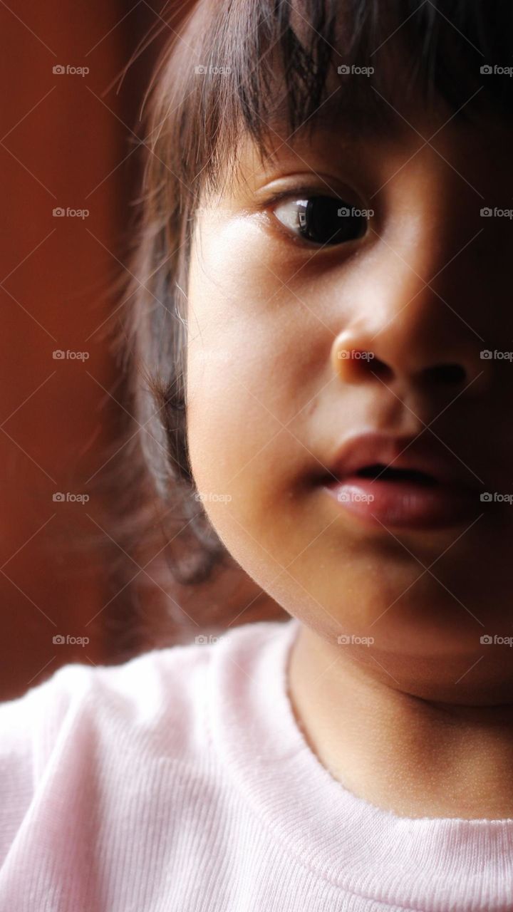 close up shot of little asian girl.