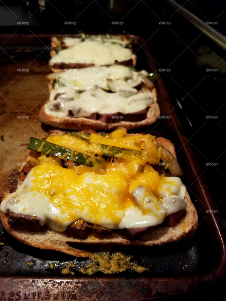 Assorted homemade cheesesteaks