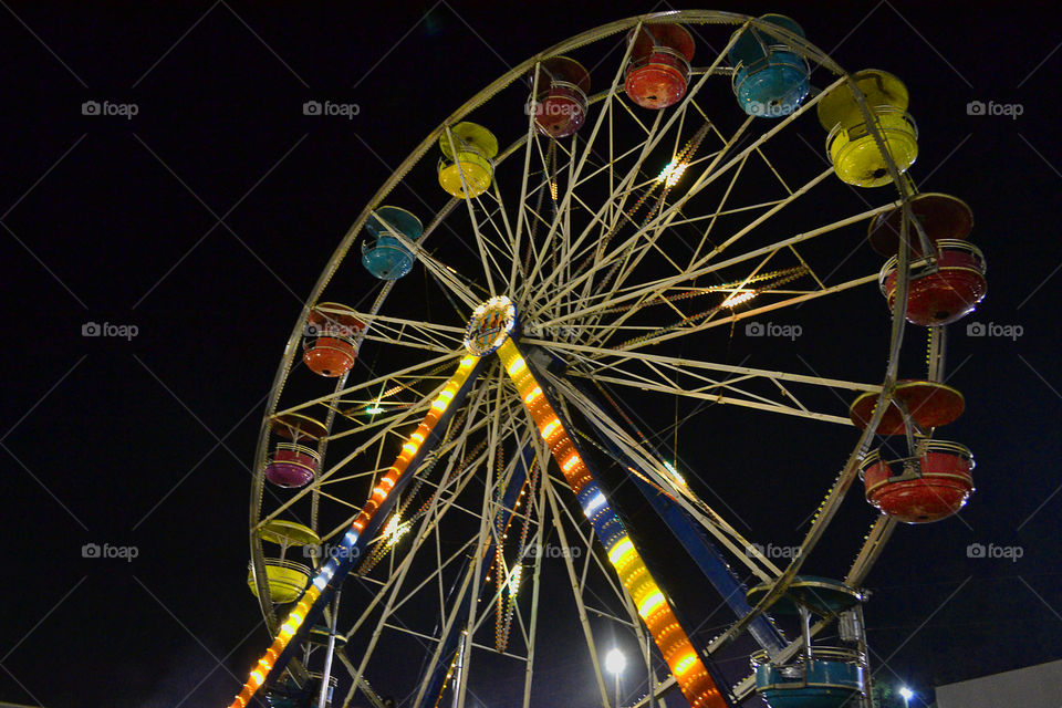 looking up at the wheel. carnival fun