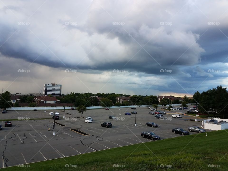 Ominous and beautiful clouds move in over a small town