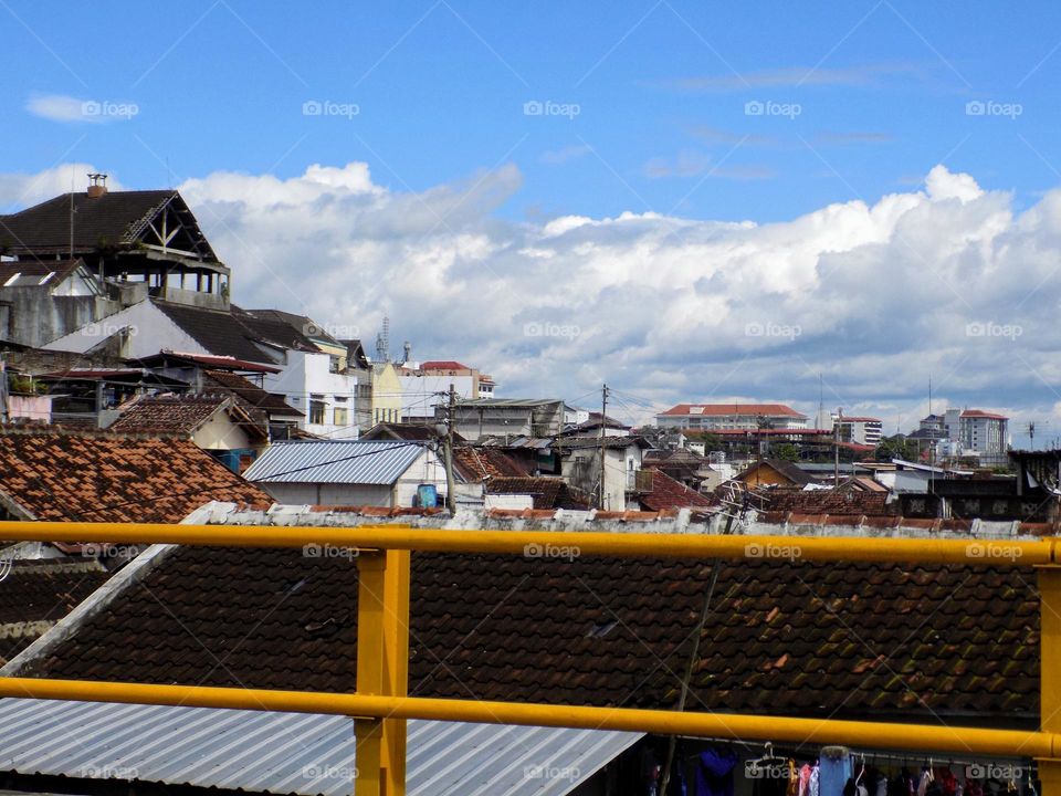 Clouds appear on a bridge